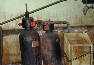 Old oxygen tanks are stored somewhere in Escape from the Bunker game.