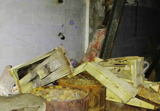 The factory is messy from years of neglect in Abandoned Rusty Factory escape.